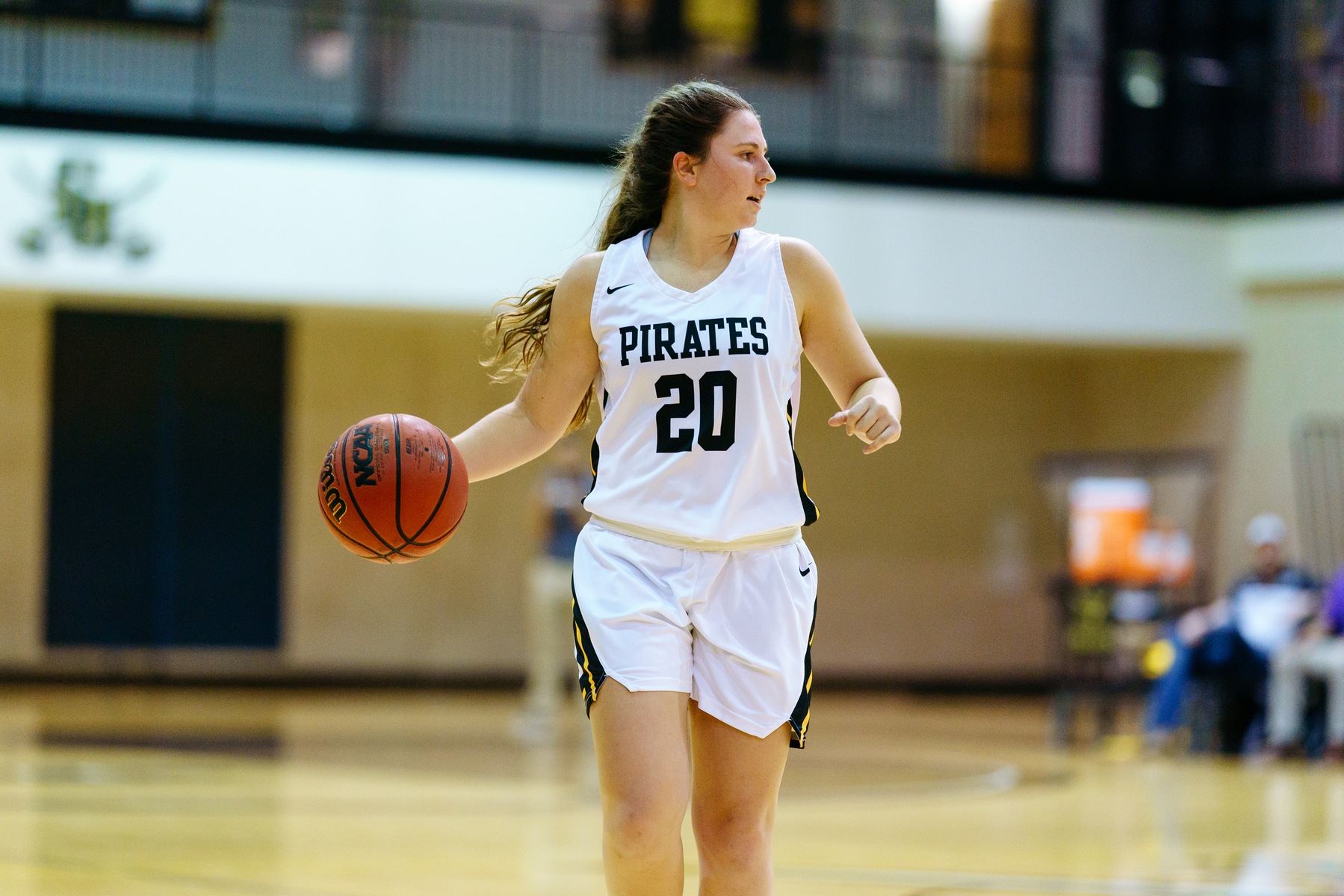Southwestern University Pirates women's basketball guard Lauren Fulenwider brings the ball up the court. 